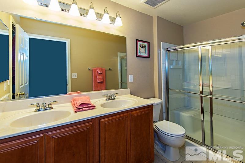 2916 Bryan Street Reno, NV 89503 - Photo 12 of 18 a bathroom with a sink toilet and shower