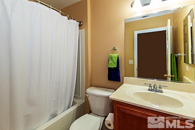 2916 Bryan Street Reno, NV 89503 - Photo 15 of 18 a bathroom with a sink toilet and shower