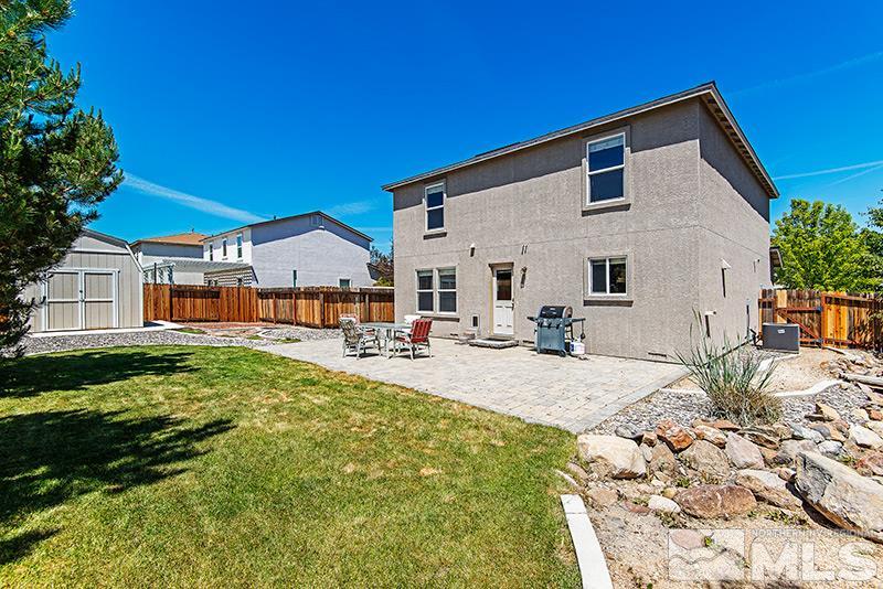 2916 Bryan Street Reno, NV 89503 - Photo 17 of 18 a front view of a house with a yard