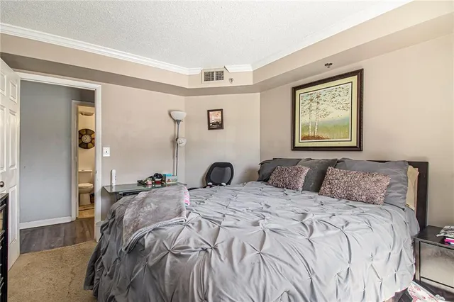 a bathroom with a toilet a sink and a mirror