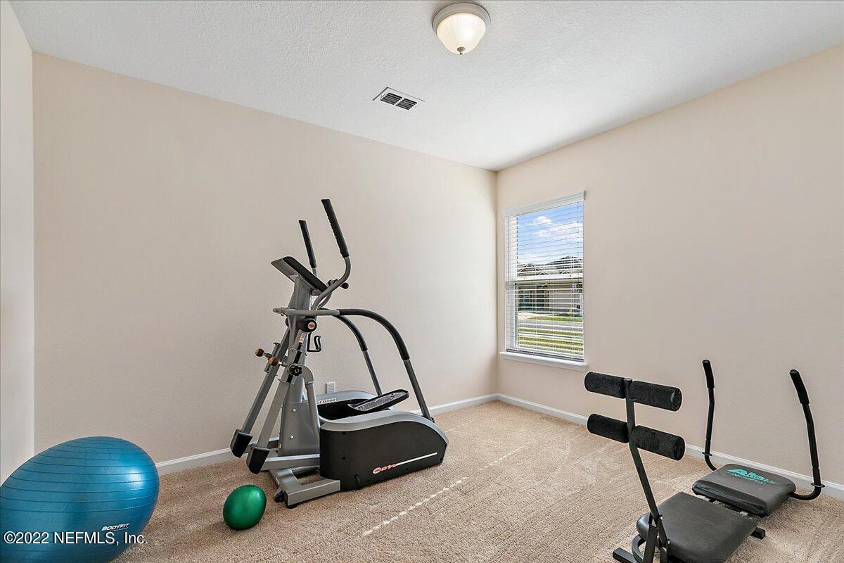 120 Toscana Lane St. Augustine, FL 32092 - Photo 14 of 29 a view of a room with gym equipment