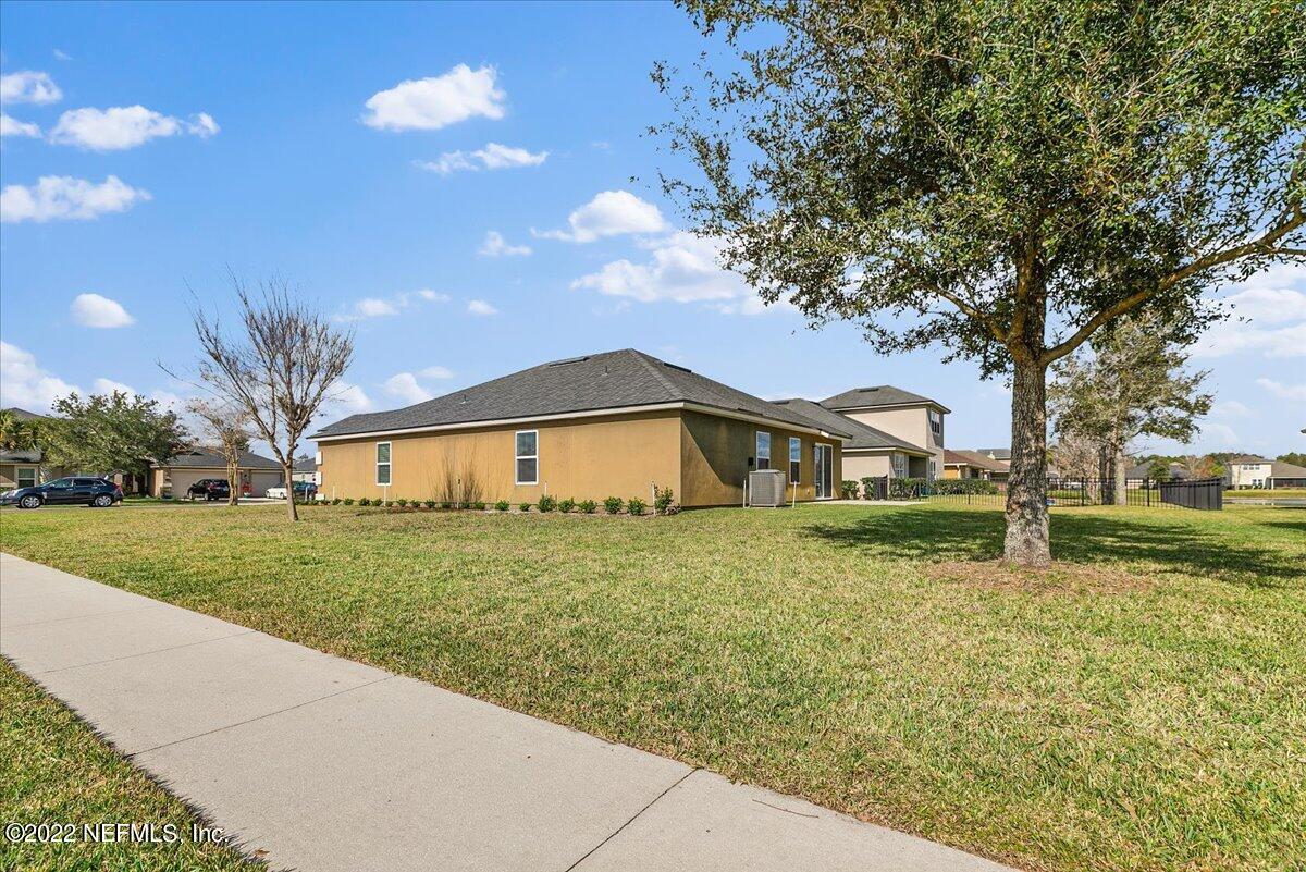 120 Toscana Lane St. Augustine, FL 32092 - Photo 21 of 29 a view of a house with a yard