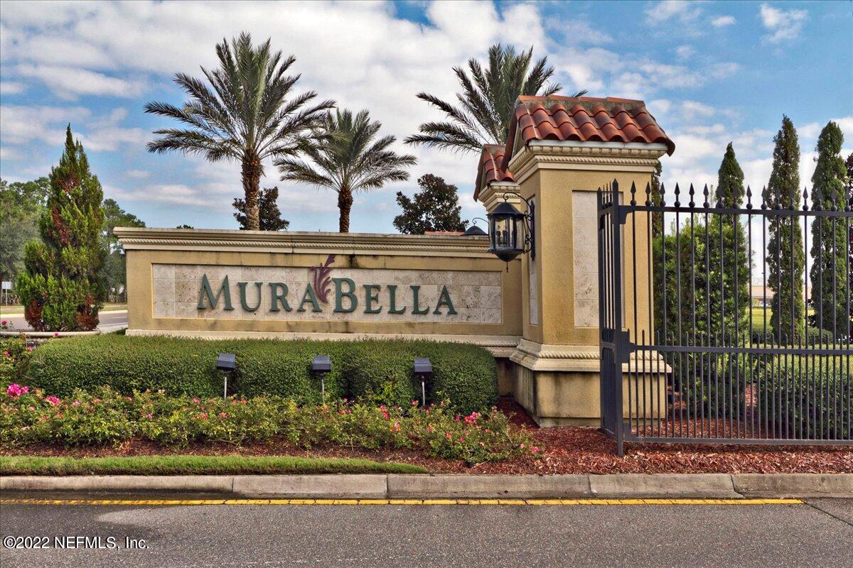 120 Toscana Lane St. Augustine, FL 32092 - Photo 22 of 29 a view of a house with a yard and potted plants