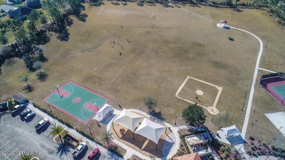 120 Toscana Lane St. Augustine, FL 32092 - Photo 27 of 29 an aerial view of a house with a yard and lake view