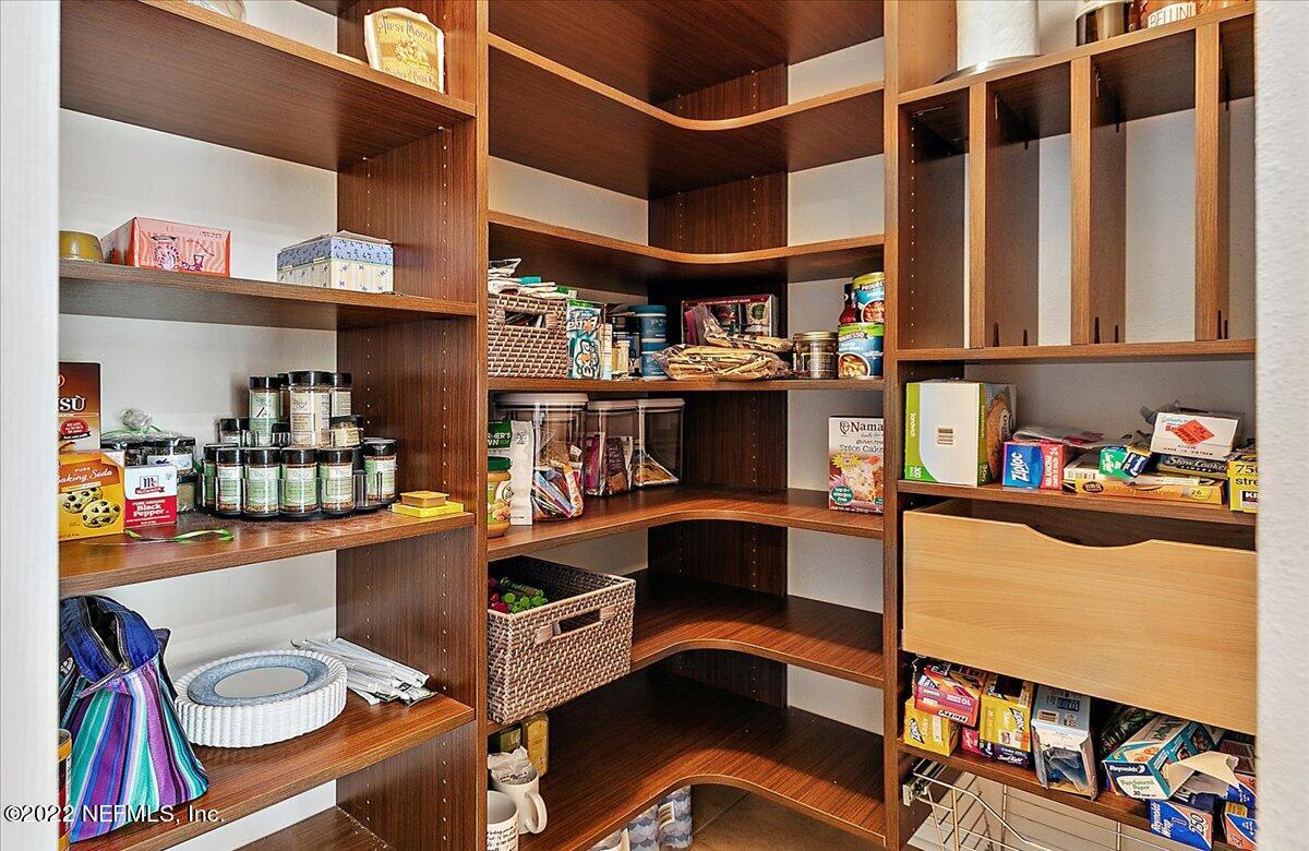 120 Toscana Lane St. Augustine, FL 32092 - Photo 8 of 29 a room with furniture and a book shelf