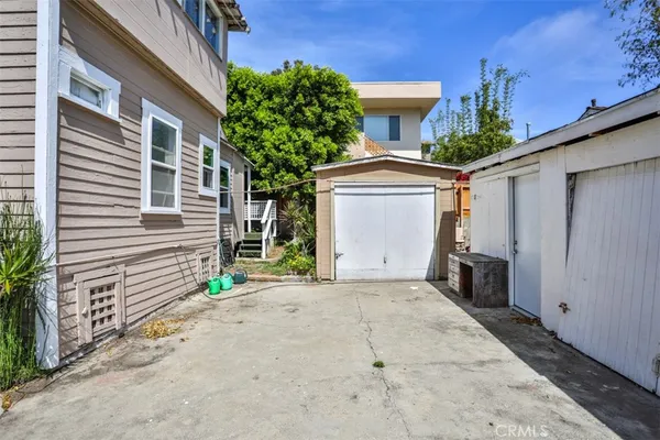 a front view of a house with a garage