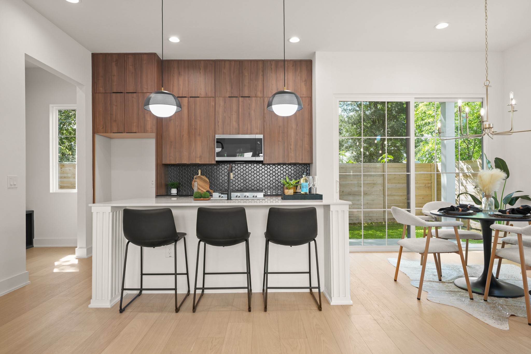 601 Vermont Road, Unit 2 Austin, TX 78702 - Photo 9 of 31 Culinary excellence meets casual dining in this open-concept kitchen with garden access.