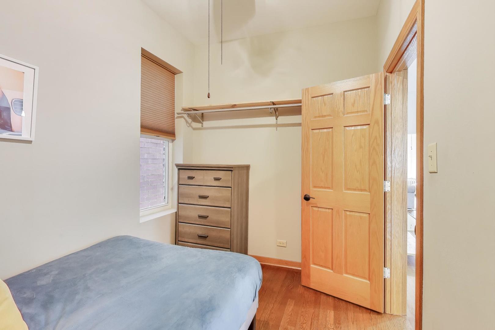 2720 West Polk Street, Unit 1 Chicago, IL 60612 - Photo 11 of 13 a view of walk in closet with empty racks