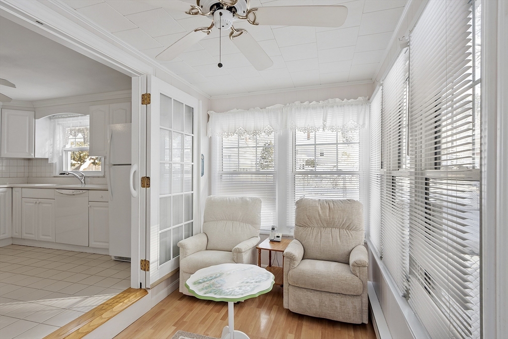 18 Frank Street Chelmsford, MA 01863 - Photo 16 of 38 a living room with furniture and a large window