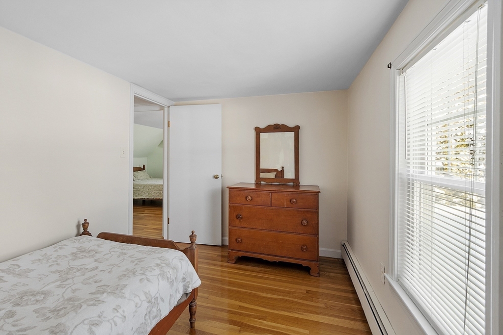 18 Frank Street Chelmsford, MA 01863 - Photo 22 of 38 a bed room with a bed and a window