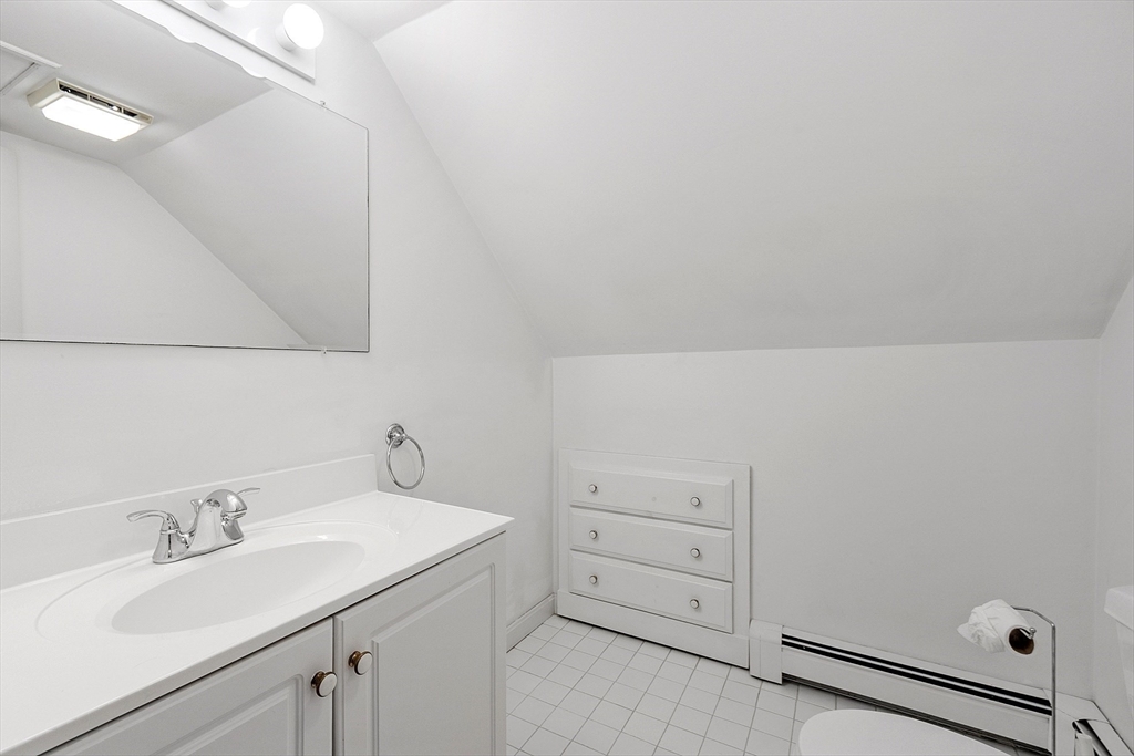 18 Frank Street Chelmsford, MA 01863 - Photo 25 of 38 a bathroom with a sink and vanity