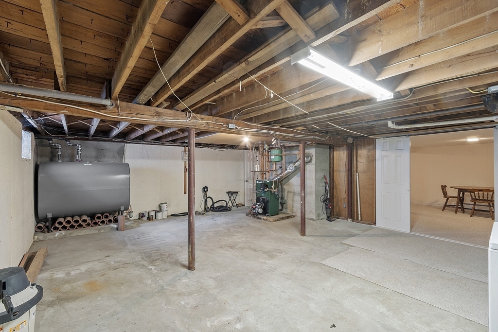 18 Frank Street Chelmsford, MA 01863 - Photo 30 of 38 a view of a room with gym equipment