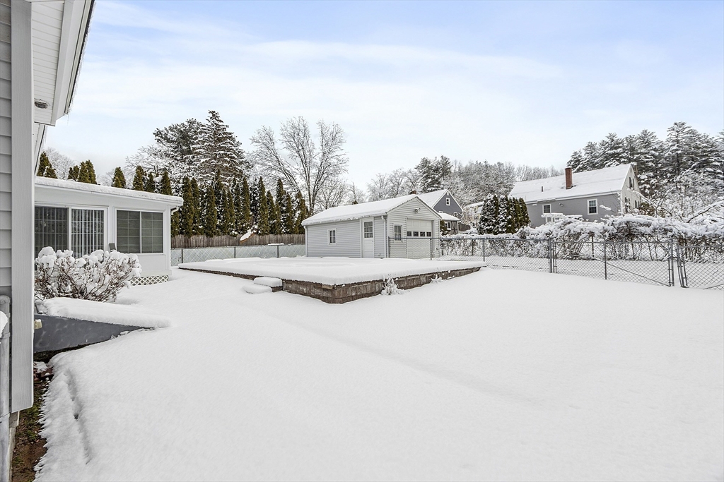 18 Frank Street Chelmsford, MA 01863 - Photo 32 of 38 a view of a house with a outdoor space