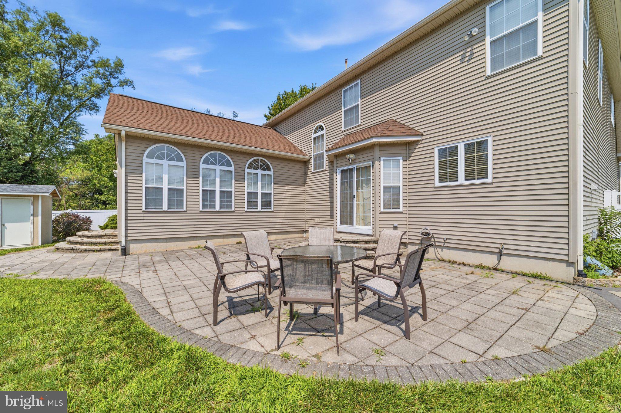 537 Riggs Avenue Berlin, NJ 08009 - Photo 30 of 32 Charming patio for outdoor gatherings.