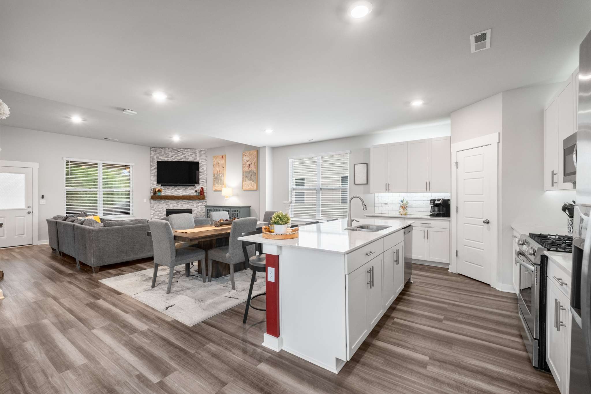 3122 Rift Lane Murfreesboro, TN 37130 - Photo 13 of 55 a large white kitchen with a stove and a sink