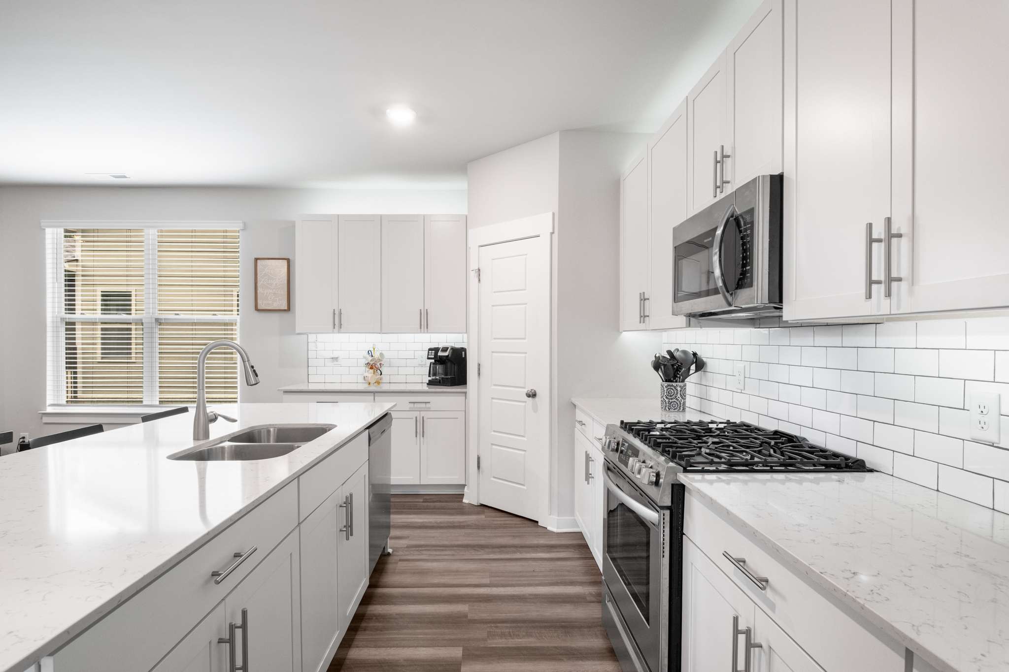 3122 Rift Lane Murfreesboro, TN 37130 - Photo 14 of 55 a kitchen with granite countertop a sink stove and cabinets
