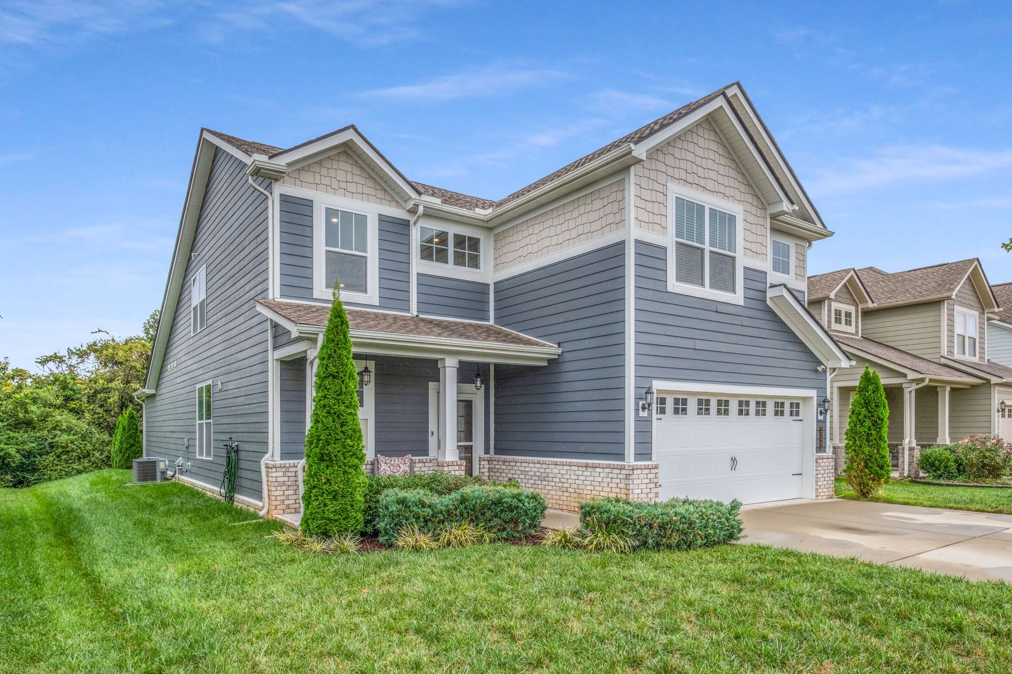 3122 Rift Lane Murfreesboro, TN 37130 - Photo 2 of 55 a front view of a house with a garden and plants