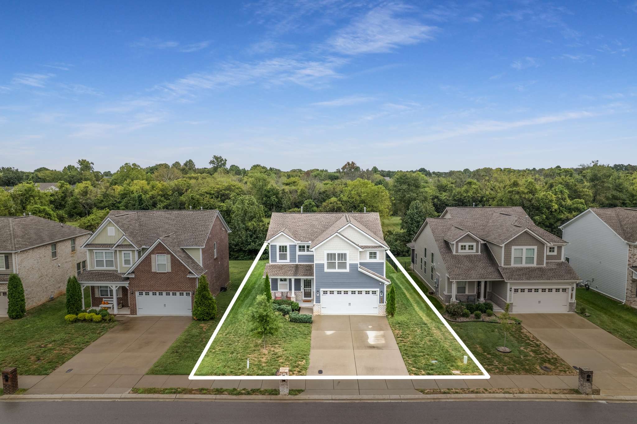 3122 Rift Lane Murfreesboro, TN 37130 - Photo 51 of 55 a view of a big house with a big yard and large trees