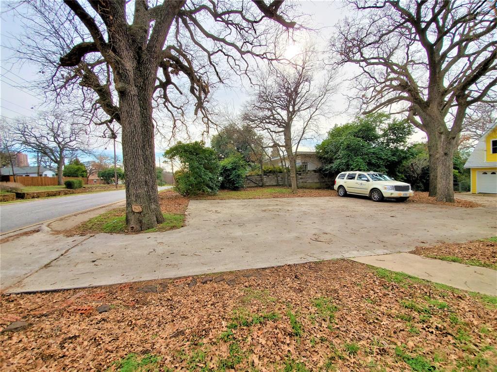 2223 North Locust Street Denton, TX 76209 - Photo 6 of 33 a car parked on the side of a road