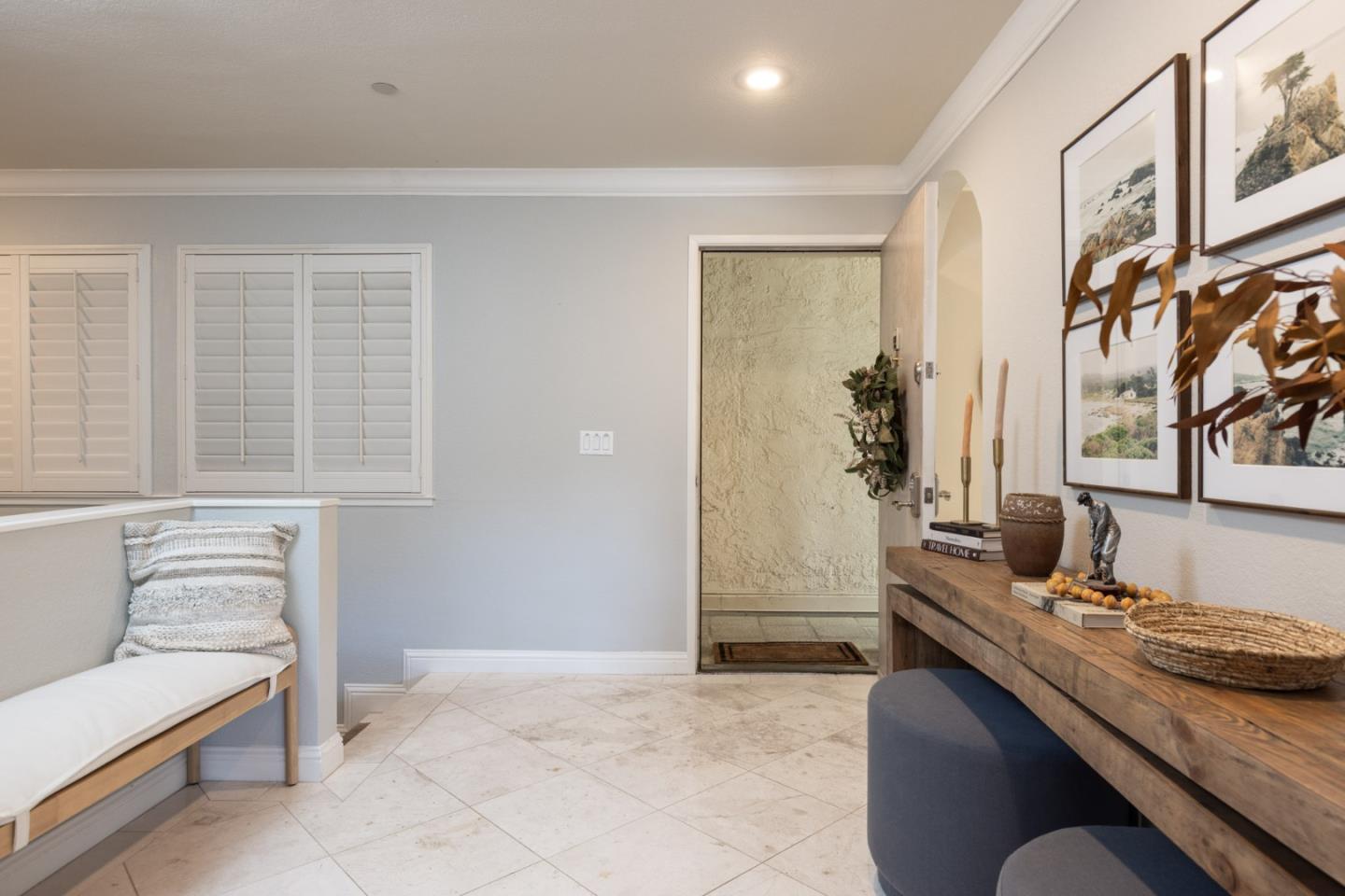 20 Shepherd's Knoll Pebble Beach, CA 93953 - Photo 14 of 23 a bathroom with a granite countertop sink and a mirror