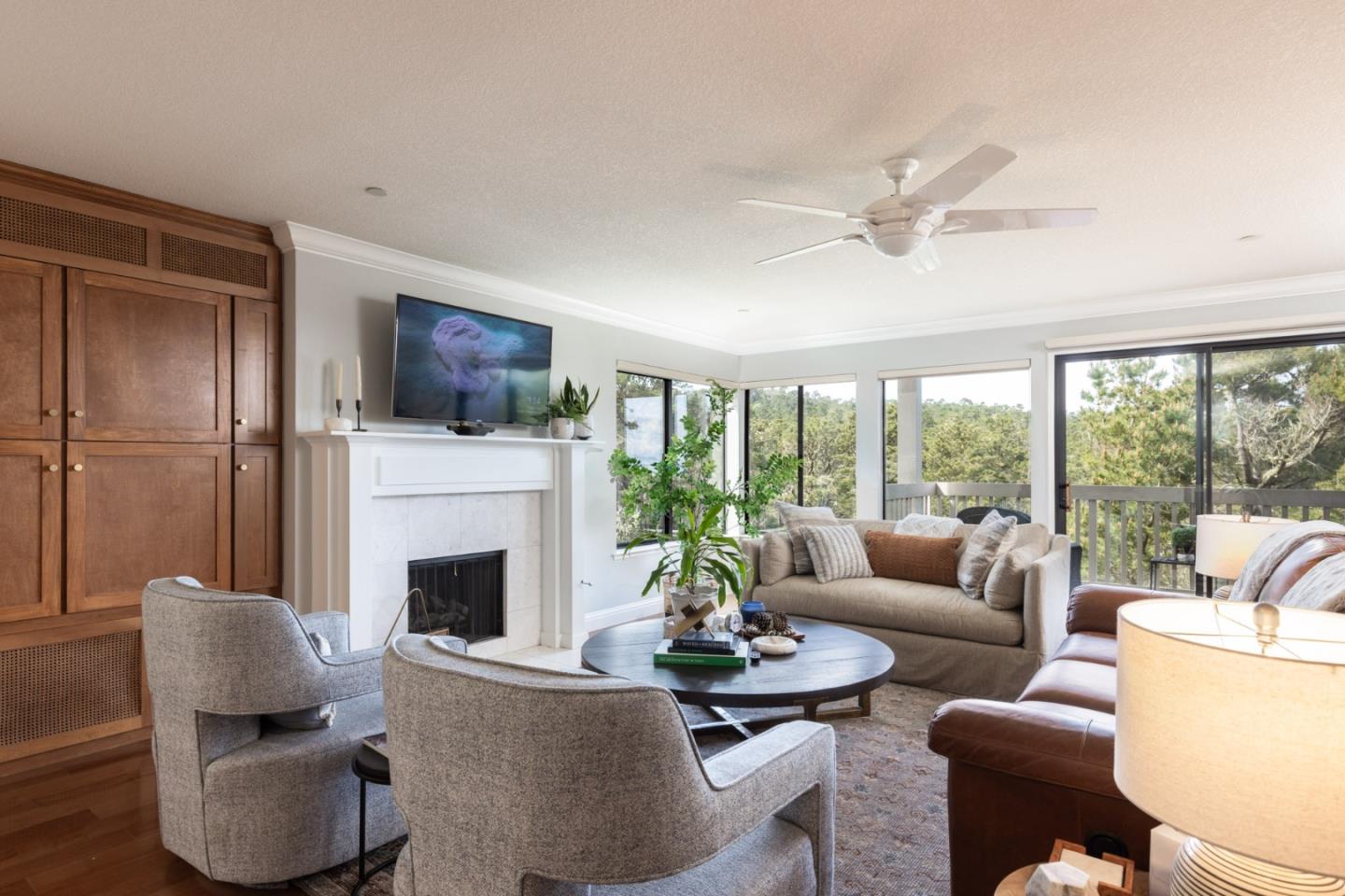 20 Shepherd's Knoll Pebble Beach, CA 93953 - Photo 2 of 23 a living room with furniture a fireplace and a large window