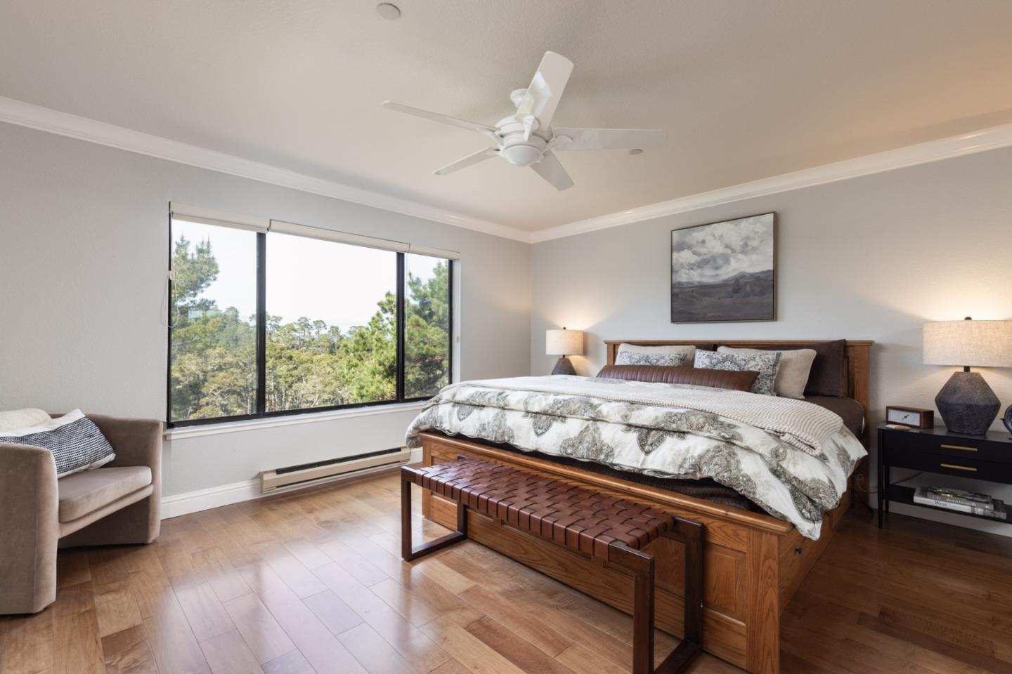 20 Shepherd's Knoll Pebble Beach, CA 93953 - Photo 10 of 23 a bed sitting in a spacious bedroom next to a window