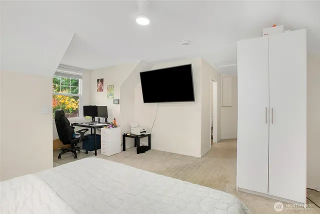 a view of a livingroom with a flat screen tv