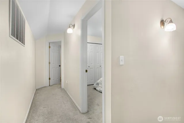 a bedroom with a bed and a desk