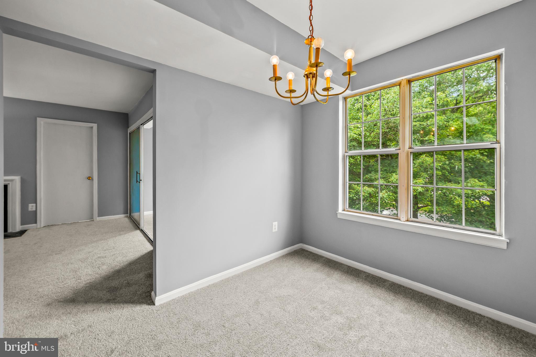 6 Normandy Square Court, Unit 2CF Silver Spring, MD 20906 - Photo 19 of 42 a view of an empty room with a window