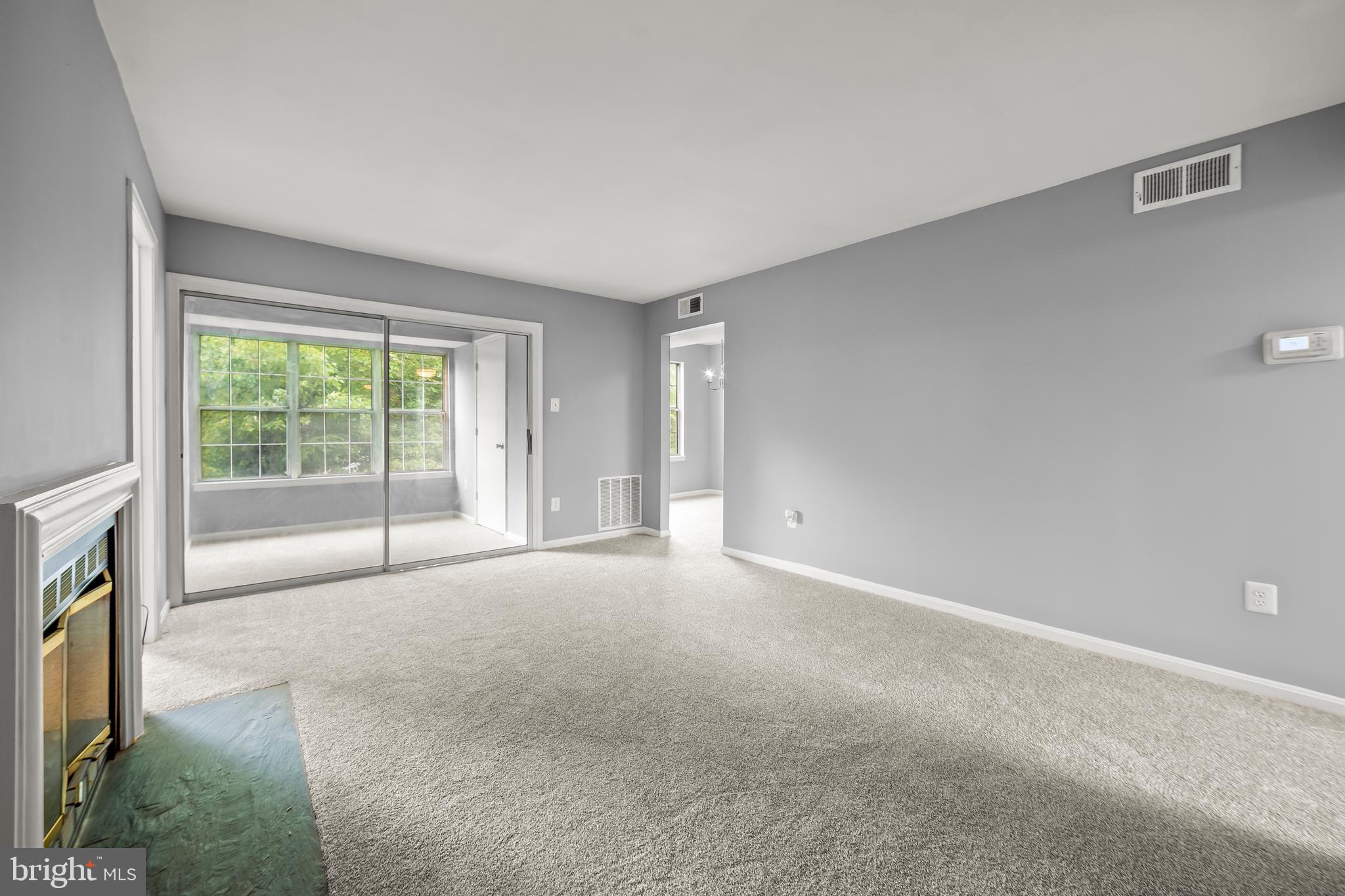 6 Normandy Square Court, Unit 2CF Silver Spring, MD 20906 - Photo 33 of 42 a view of empty room with floor to ceiling window
