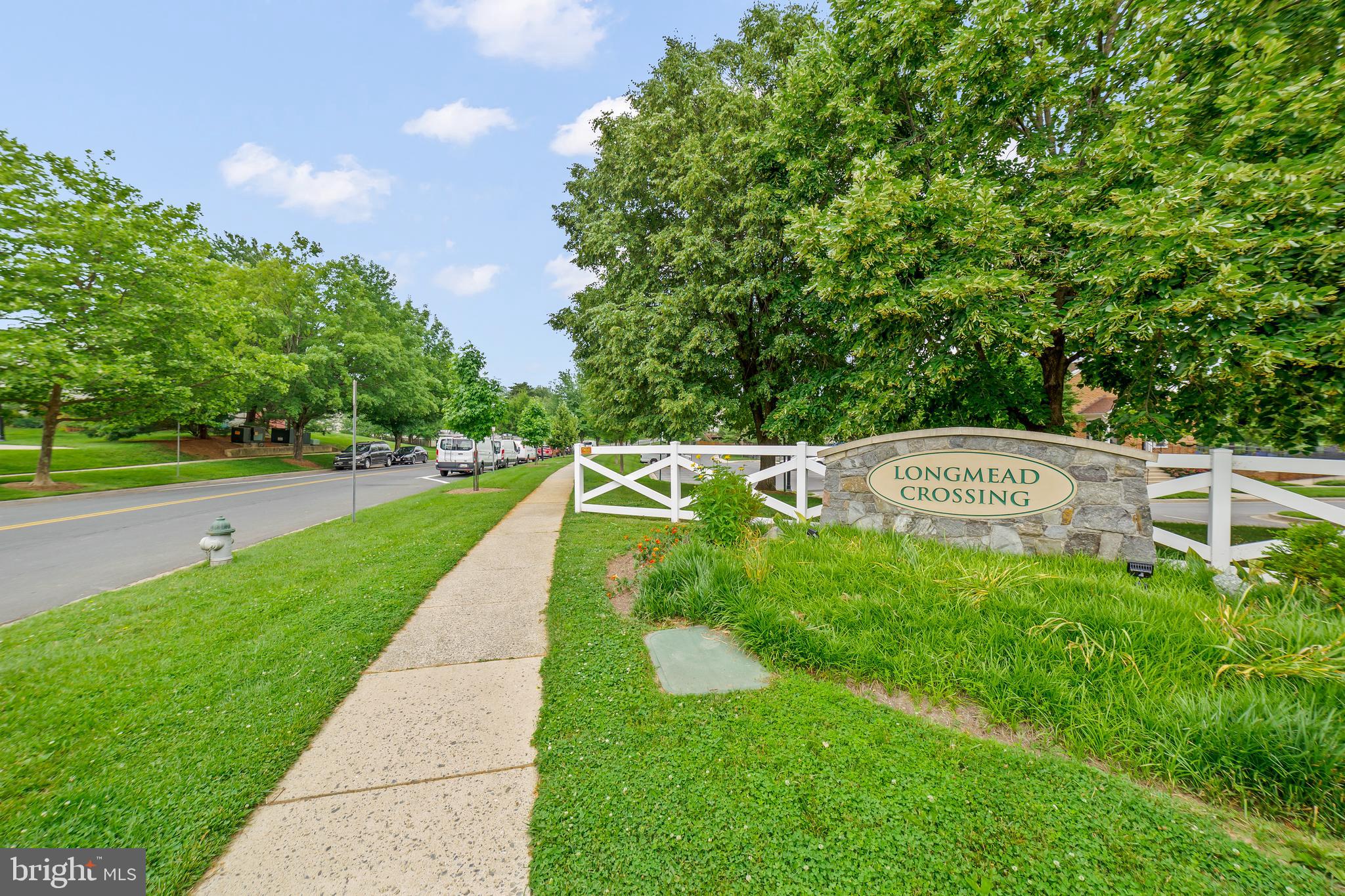6 Normandy Square Court, Unit 2CF Silver Spring, MD 20906 - Photo 35 of 42 a view of yard with swimming pool and green space