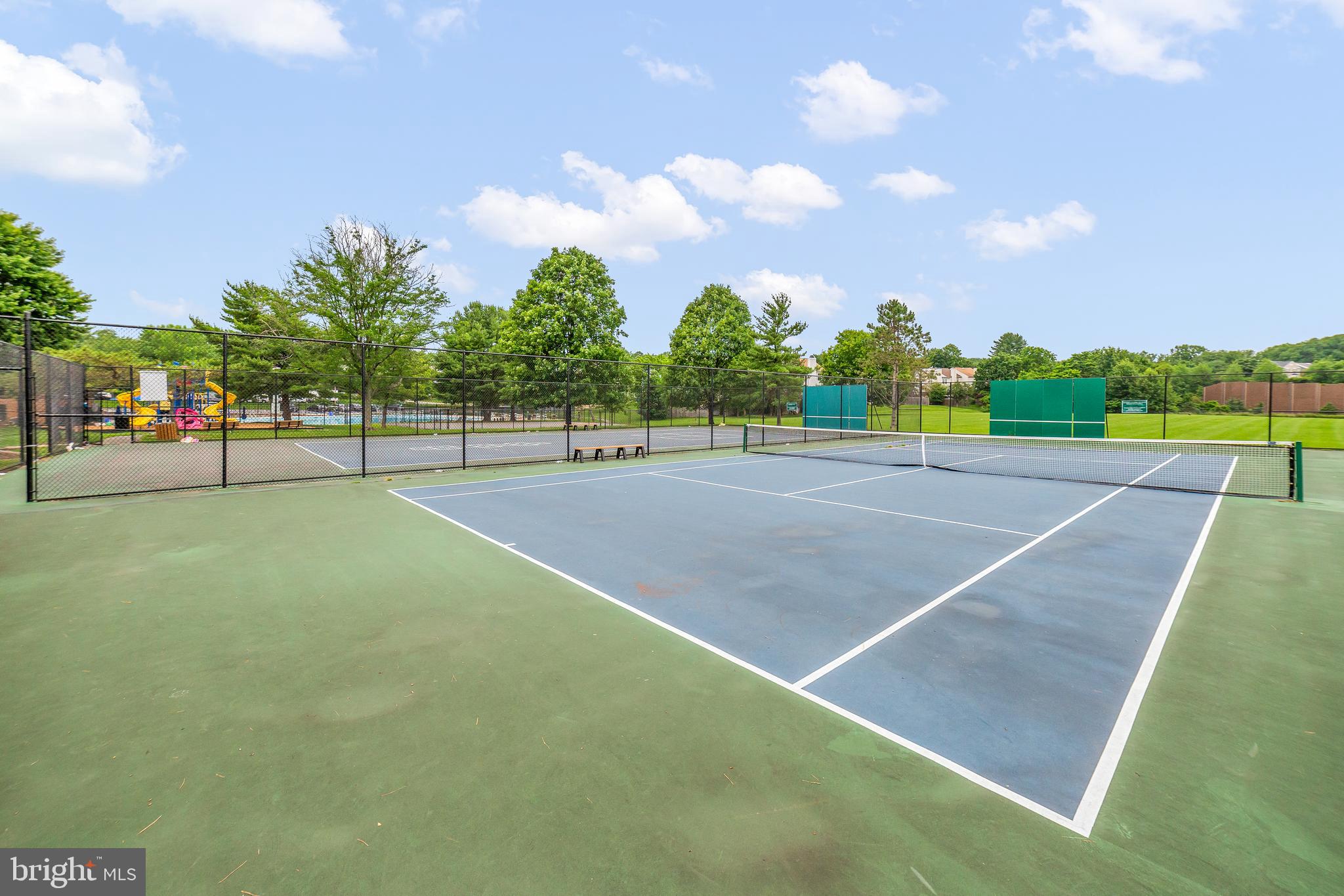 6 Normandy Square Court, Unit 2CF Silver Spring, MD 20906 - Photo 37 of 42 a view of an outdoor space and tennis court
