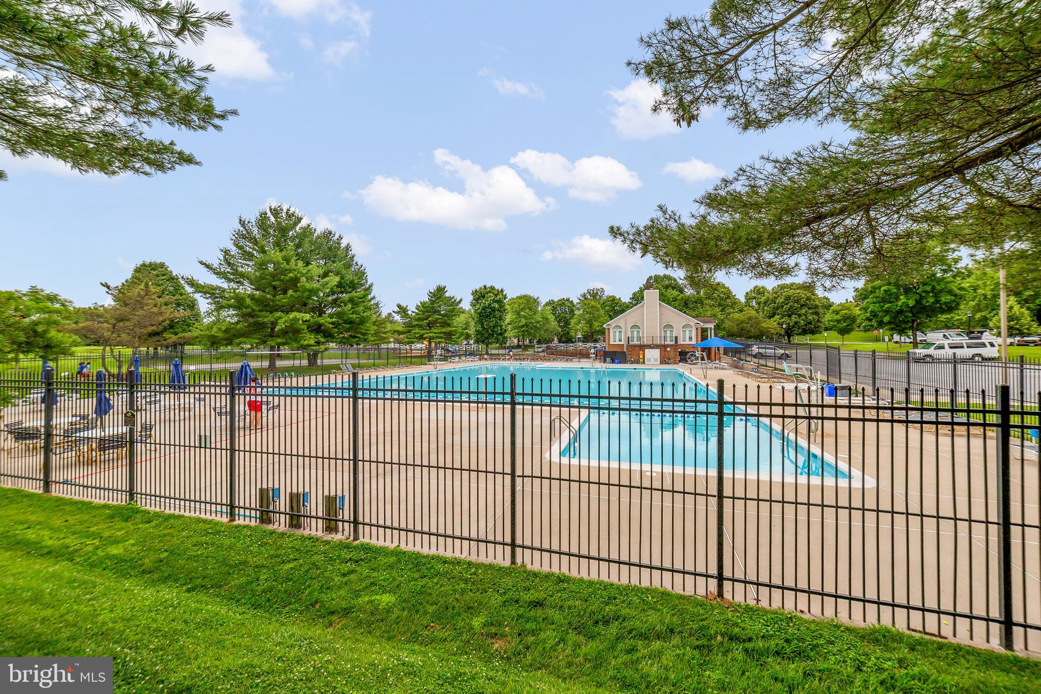 6 Normandy Square Court, Unit 2CF Silver Spring, MD 20906 - Photo 40 of 42 a view of a backyard with large trees
