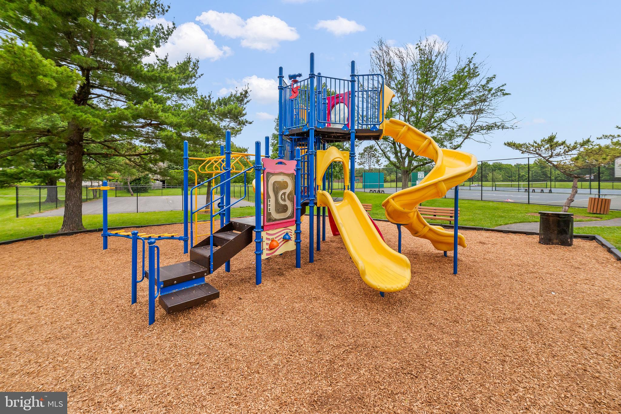 6 Normandy Square Court, Unit 2CF Silver Spring, MD 20906 - Photo 41 of 42 a view of a park with slide and a bench