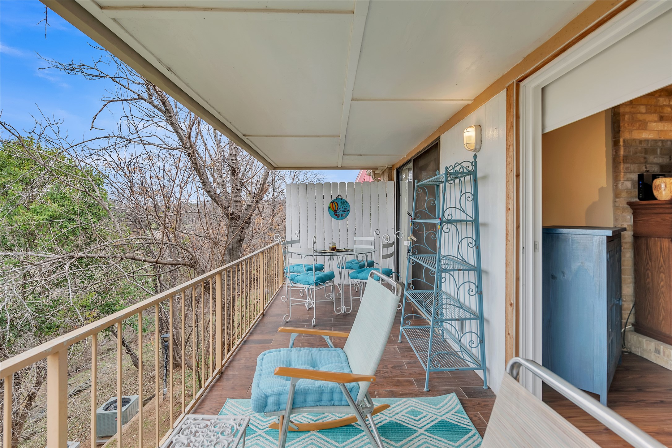 1201 Ranch Road 1431, Unit 8 Marble Falls, TX 78654 - Photo 21 of 24 Two sliding doors to balcony