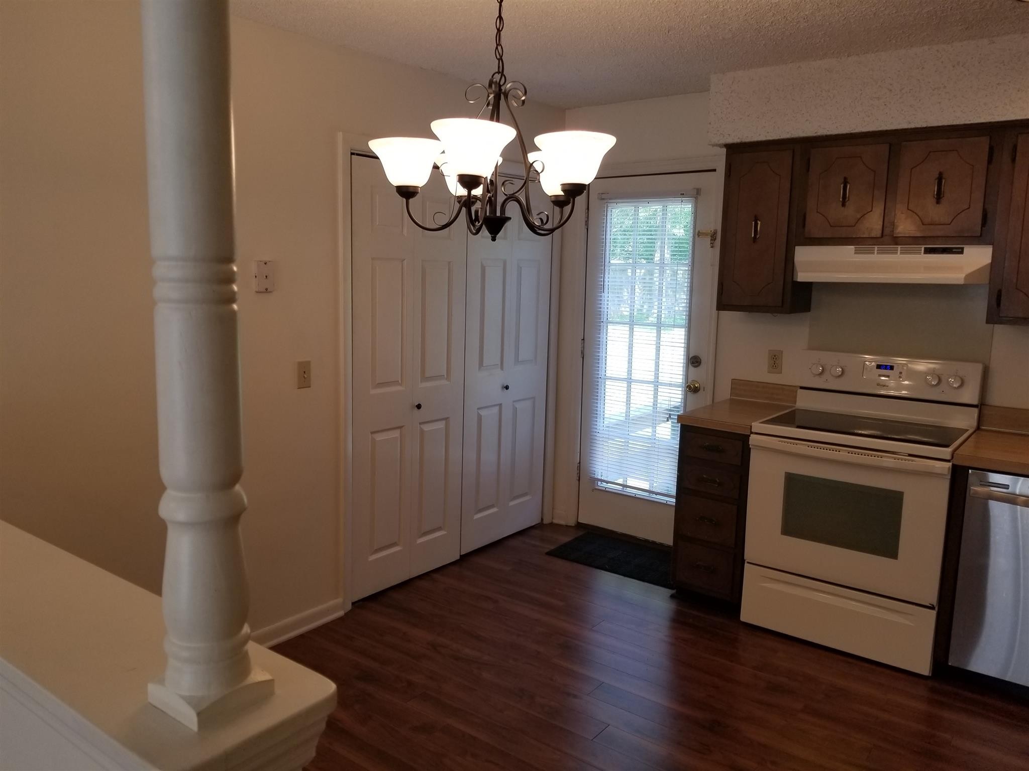 3116 Stoneybrook Circle Antioch, TN 37013 - Photo 5 of 13 a kitchen with stainless steel appliances granite countertop wooden floors and granite counter tops