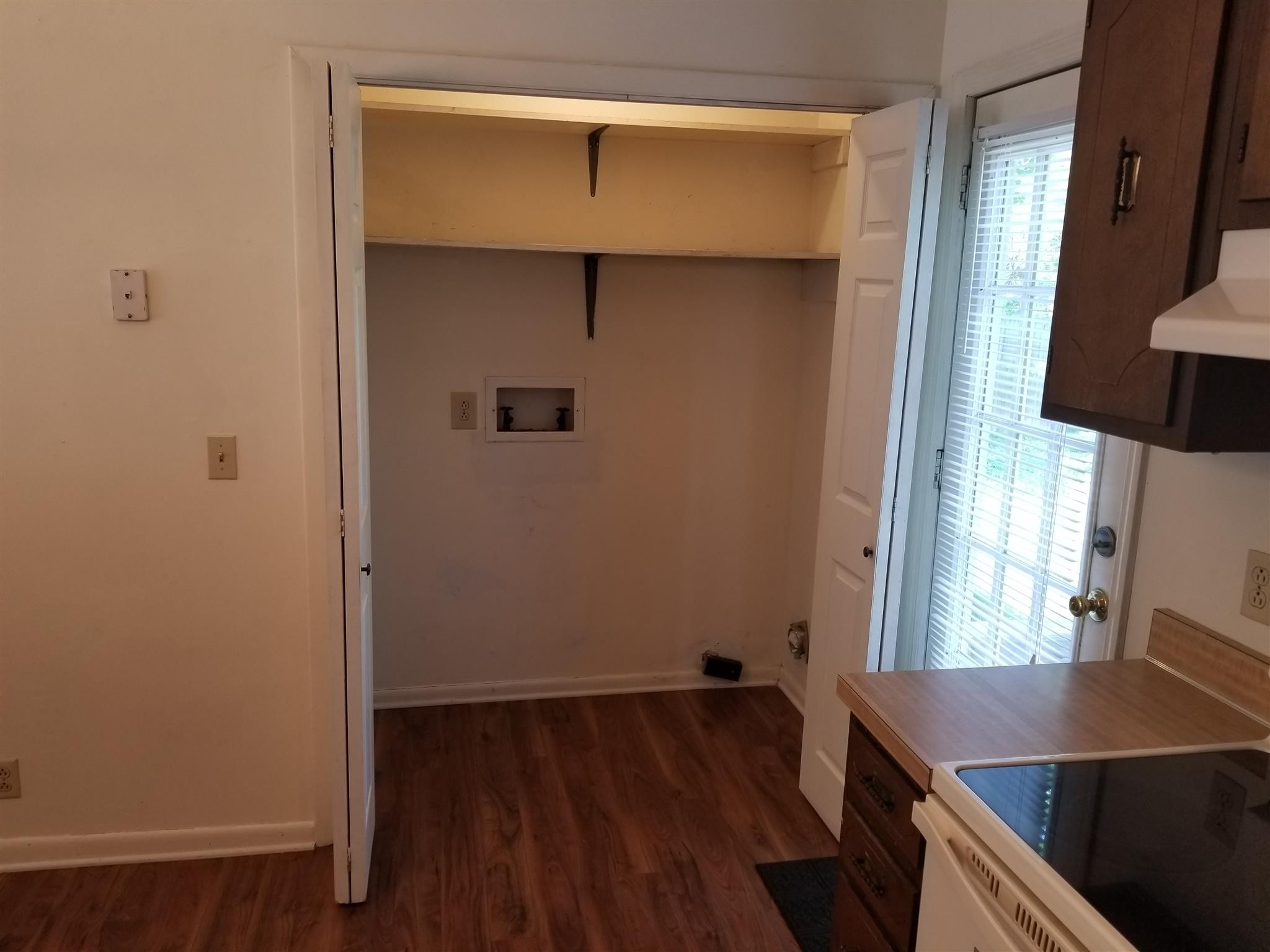 3116 Stoneybrook Circle Antioch, TN 37013 - Photo 6 of 13 a room with wooden floor and windows