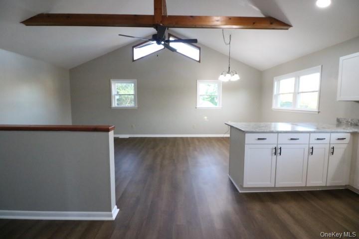 3218 Rte 9W, Unit 1 Saugerties, NY 12477 - Photo 12 of 13 a view of a livingroom with wooden floor and a window