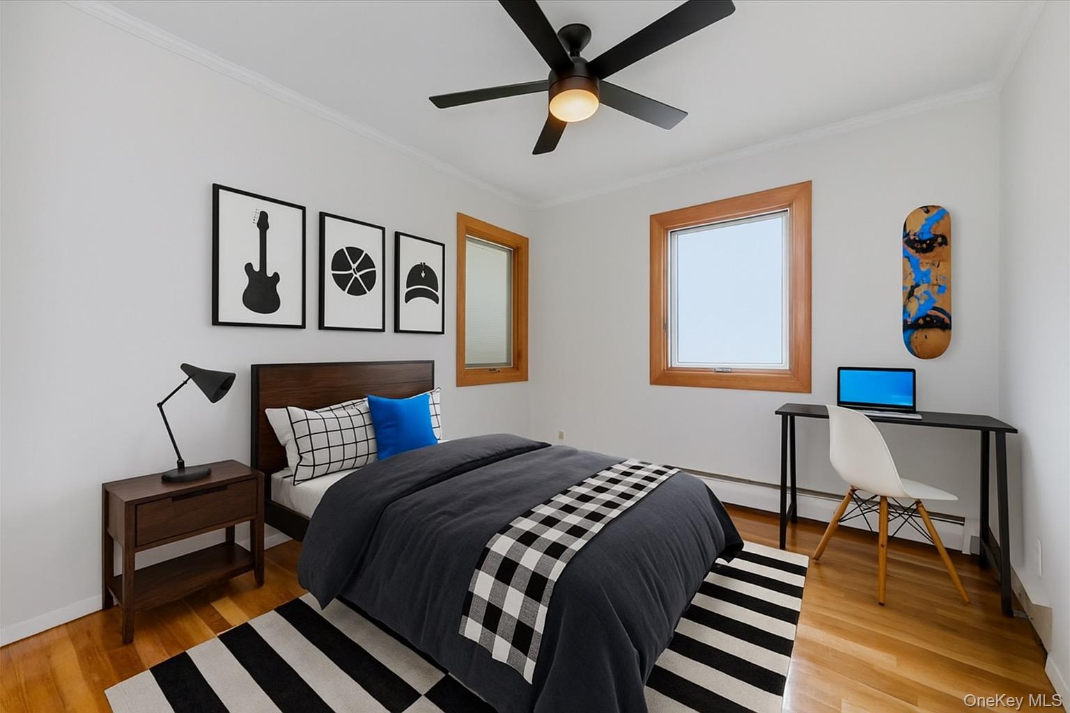 930 Jewel Drive Valley Stream, NY 11581 - Photo 20 of 32 a bedroom with a bed and wooden floor