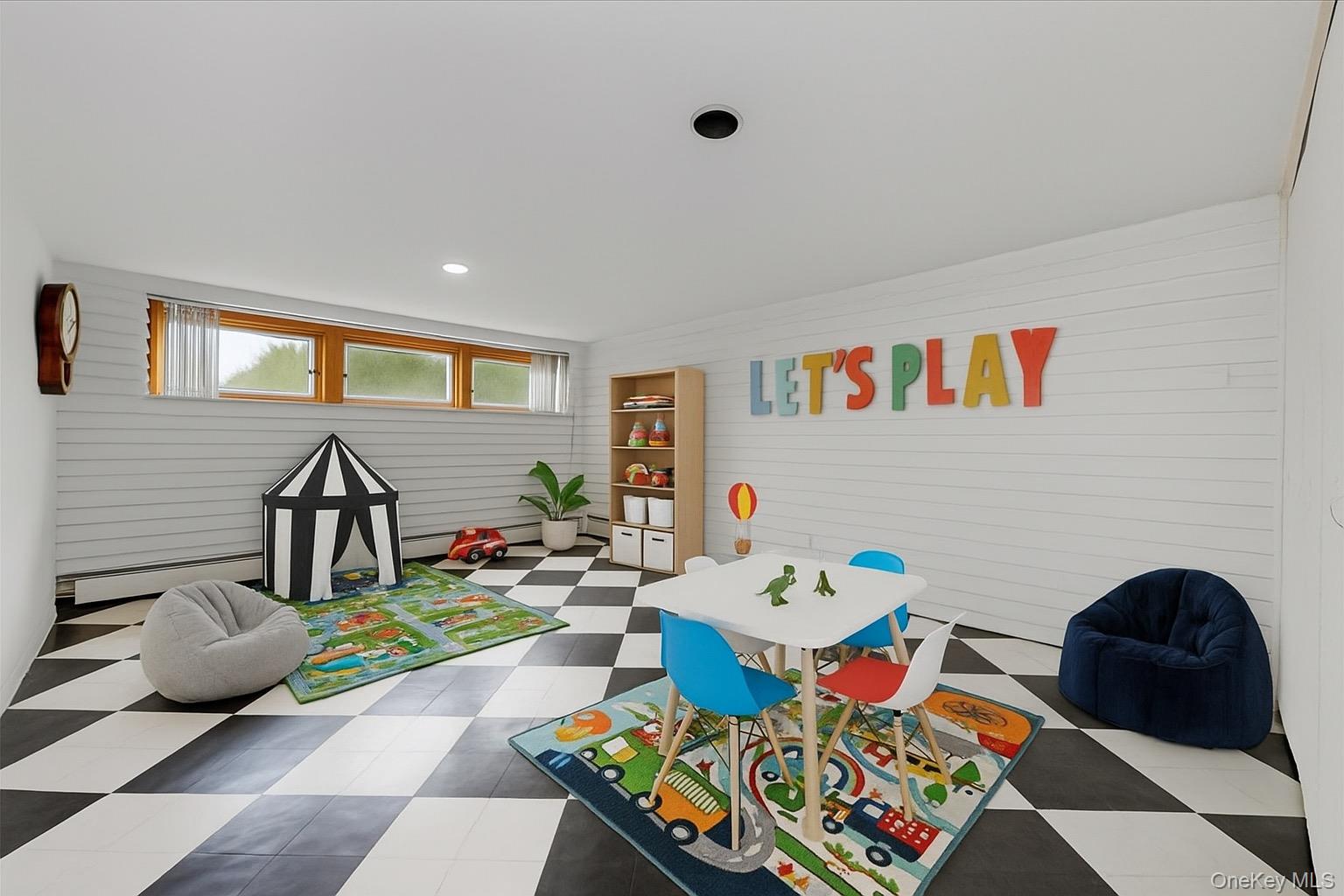 930 Jewel Drive Valley Stream, NY 11581 - Photo 23 of 32 a living room filled with lots of furniture