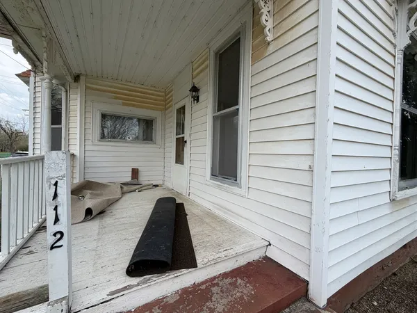 a view of a back yard of the house