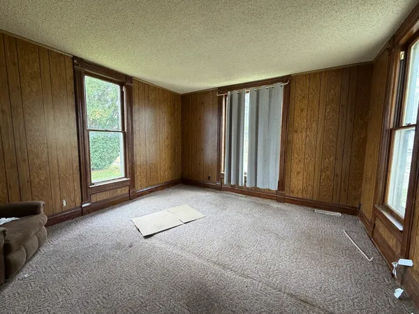 an empty room with windows