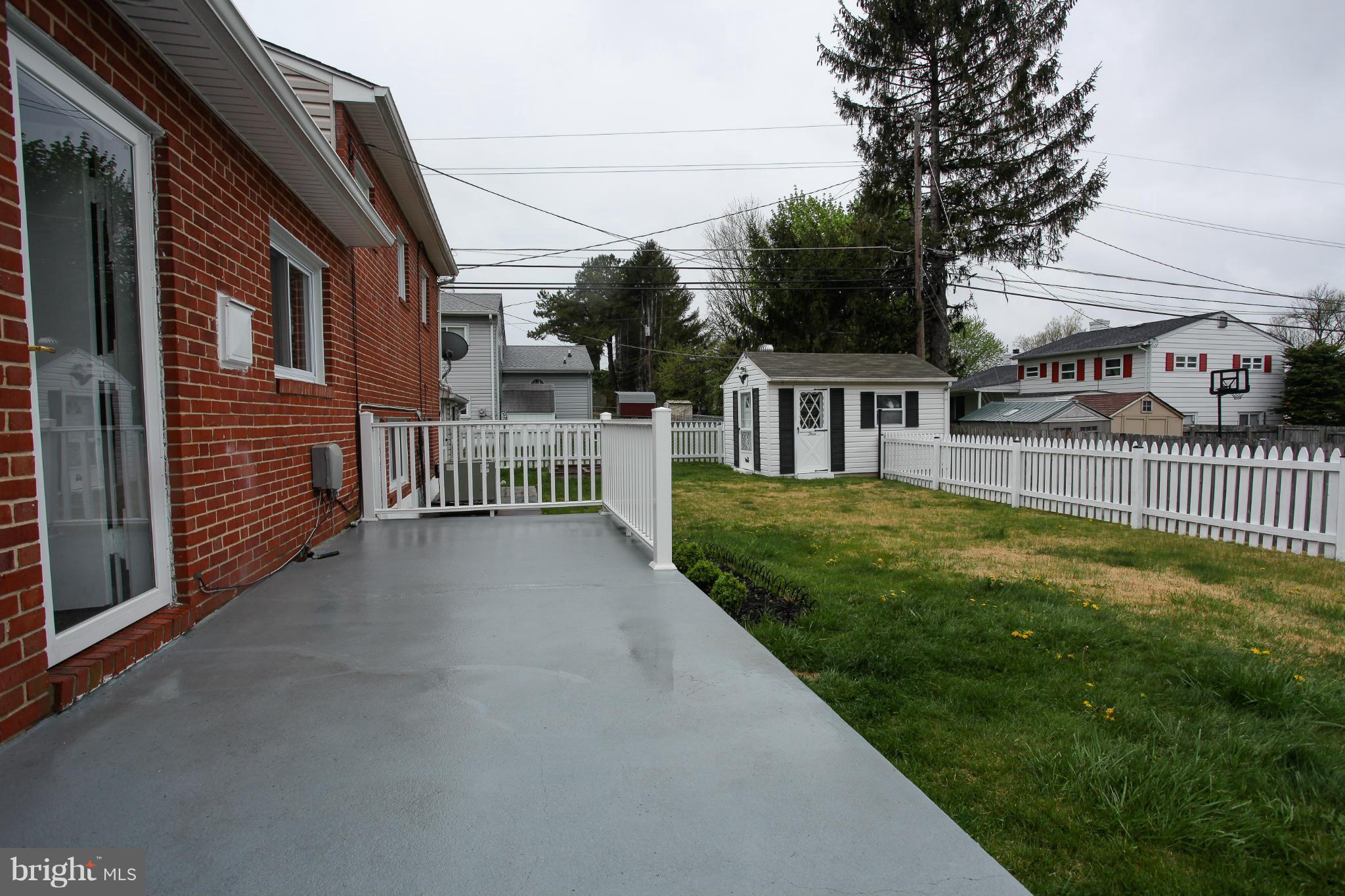 938 Vanderwood Road Baltimore, MD 21228 - Photo 23 of 26 a view of a house with backyard and porch