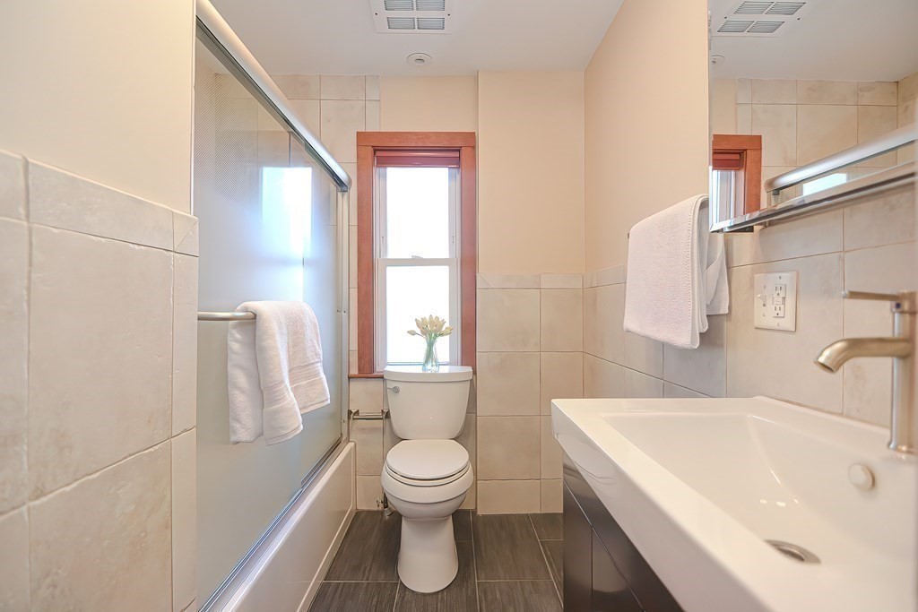 39 Pine Crest Road Newton, MA 02459 - Photo 25 of 39 a bathroom with a sink a toilet and a bathtub