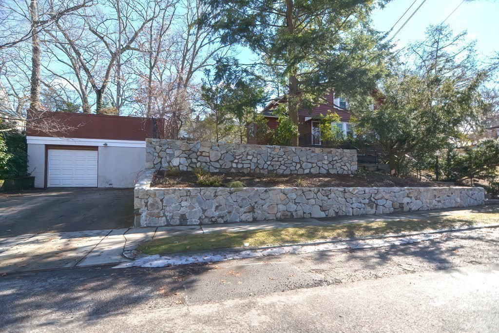 39 Pine Crest Road Newton, MA 02459 - Photo 33 of 39 a view of a yard with large tree