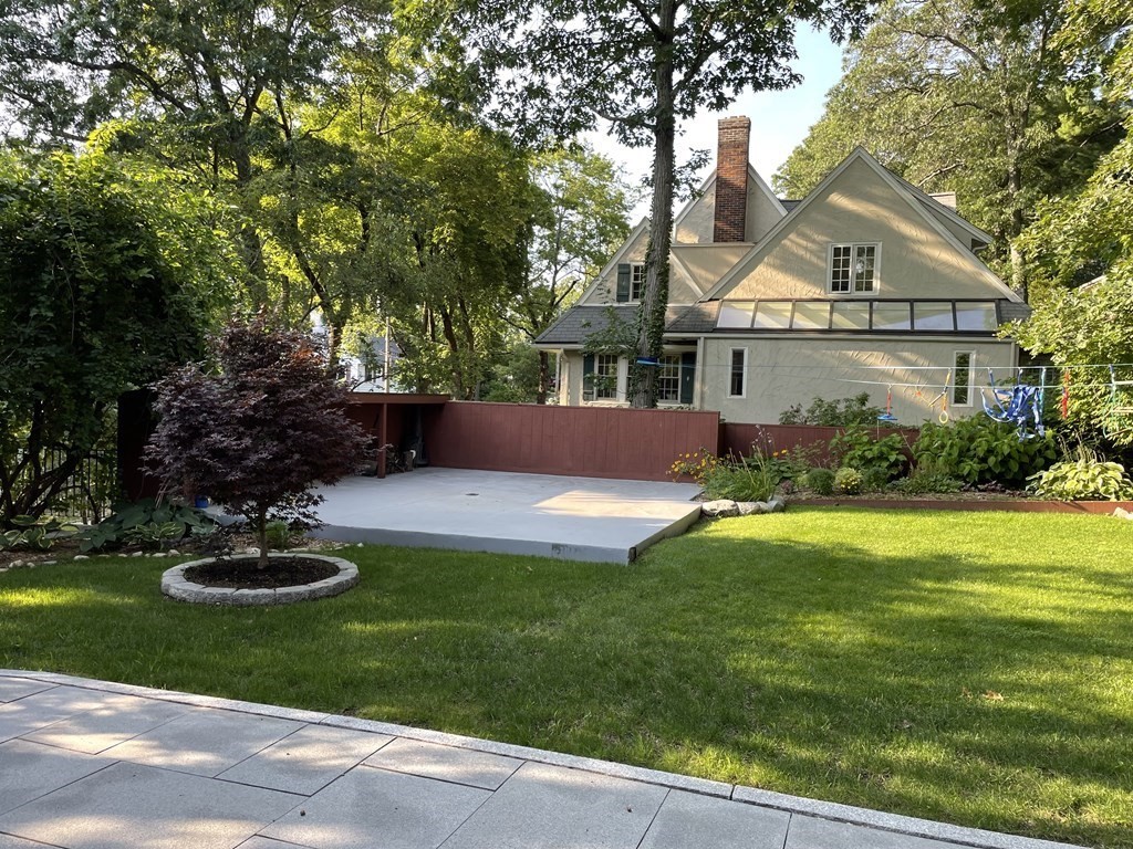 39 Pine Crest Road Newton, MA 02459 - Photo 34 of 39 a front view of a house with garden