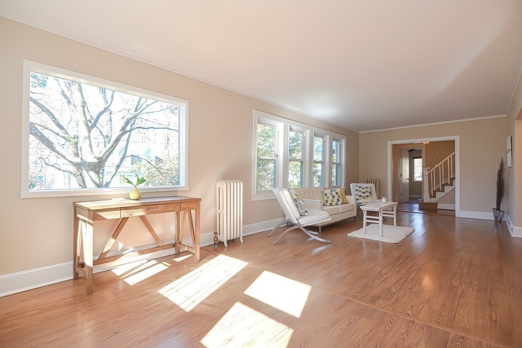 39 Pine Crest Road Newton, MA 02459 - Photo 5 of 39 a living room with fireplace furniture and a large window