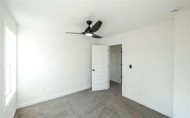 a view of a livingroom and a window