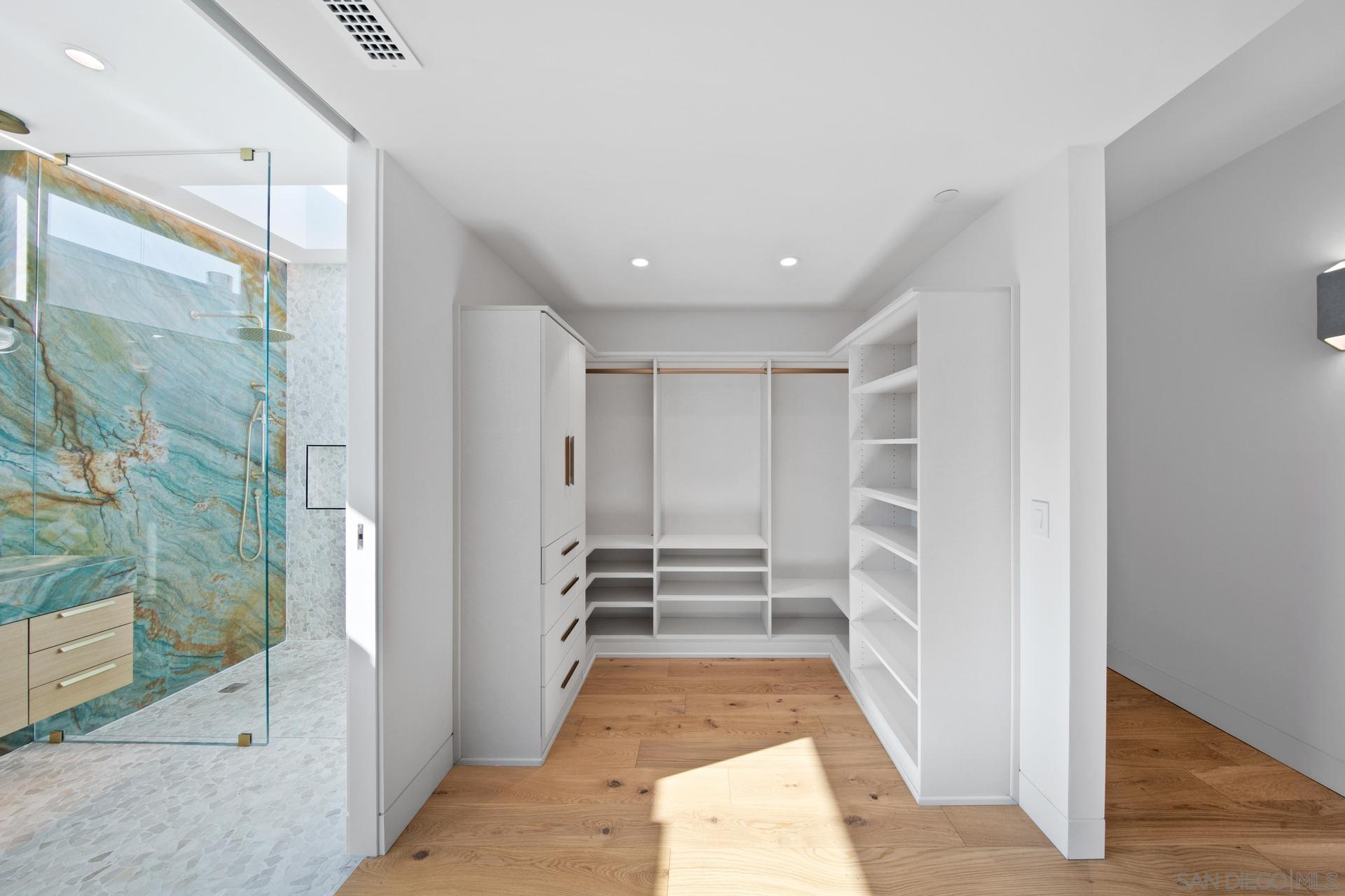 664 Cornish Drive Encinitas, CA 92024 - Photo 14 of 46 a view of walk in closet with white walls