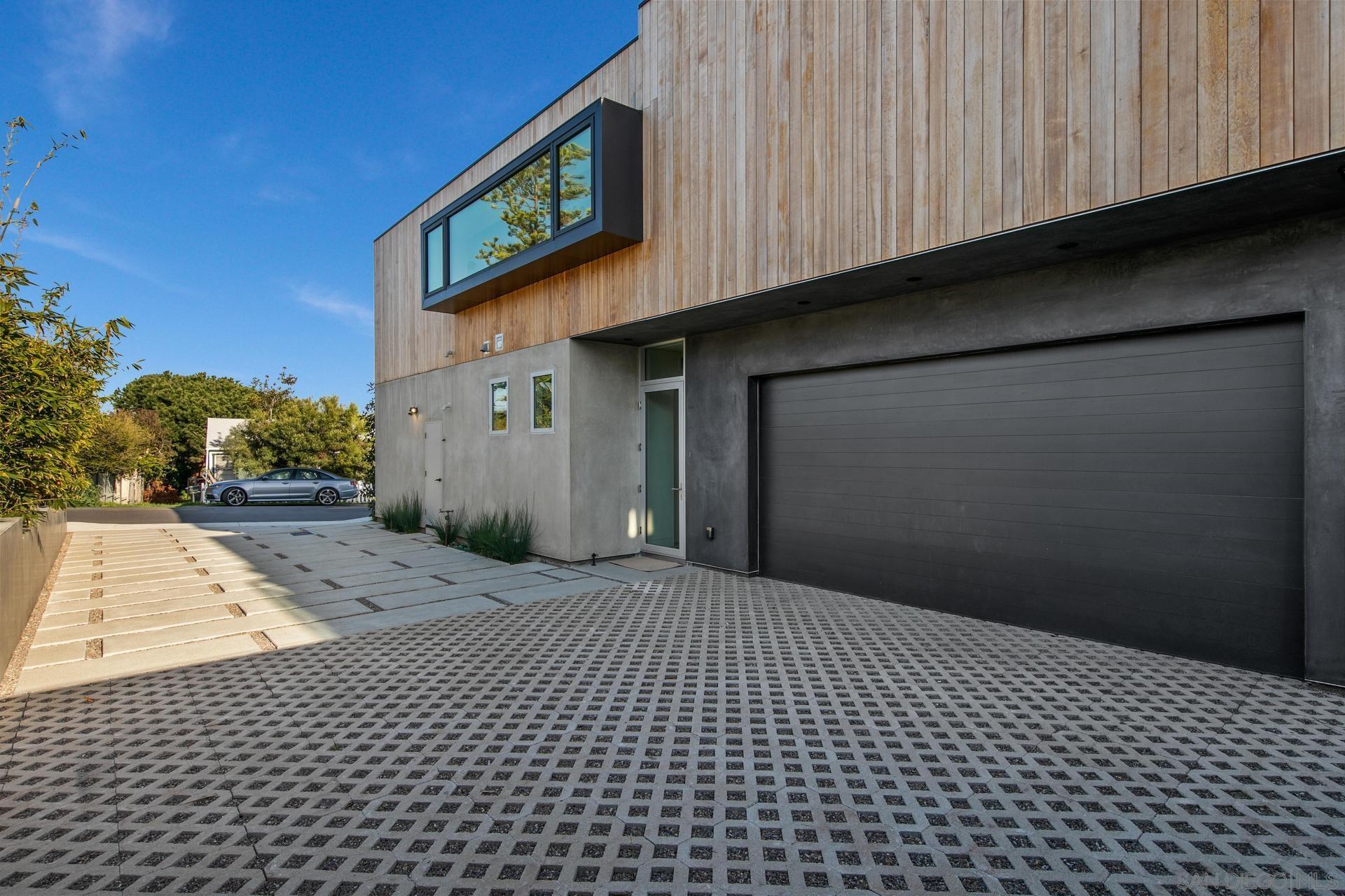 664 Cornish Drive Encinitas, CA 92024 - Photo 29 of 46 a view of a brick house with a street
